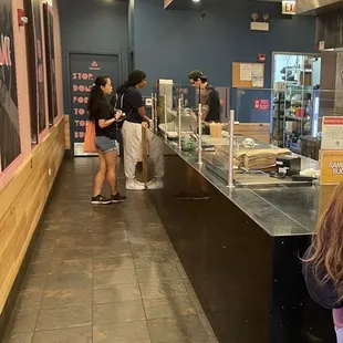 a little girl in a pink shirt