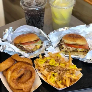 a hamburger and onion rings