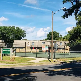 Tennis court right by the playground