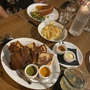 Pan de campo, crispy pork shank, Mac &amp; cheese, furthest away is the pork chop