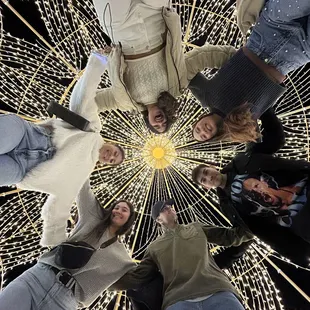 a group of people standing in a circle