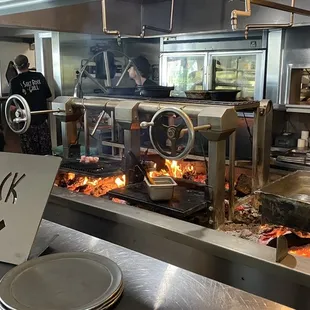 The HOT open wood grill.
