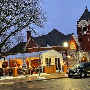 a truck parked in front of the building
