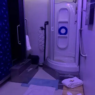 Float room -shower, towels, ear plugs, and robe. The door to tank is on the left.