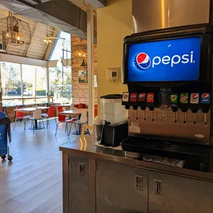 Inside. Pepsi fountain drink machine and water dispenser.