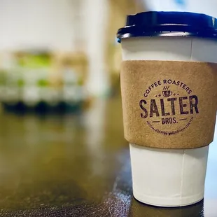 a cup of coffee on a table