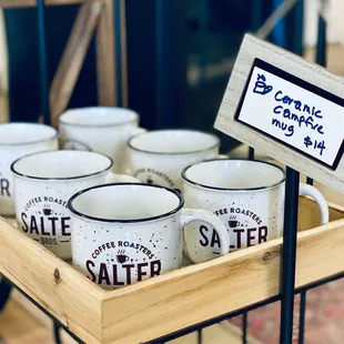 a display of salter and salter mugs