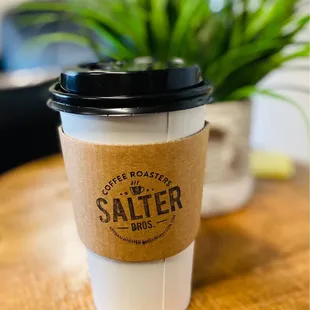 a cup of coffee on a table