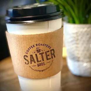 a cup of coffee on a table