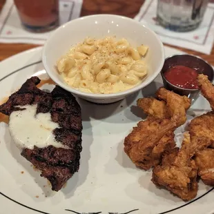 Gulf Coast steak and shrimp with a side of macaroni and cheese