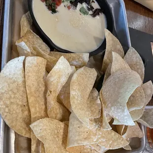 Queso fresco brisket appetizer. There&apos;s literally only a small amount of brisket for one person. It was one chunk.