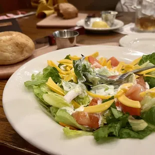 Side salad with no croutons and ranch dressing. Gluten free bread with honey butter.