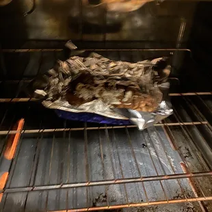 This is me reheating my Stone Cold Steak in the oven, completely ruining its tenderness and texture. So disappointing