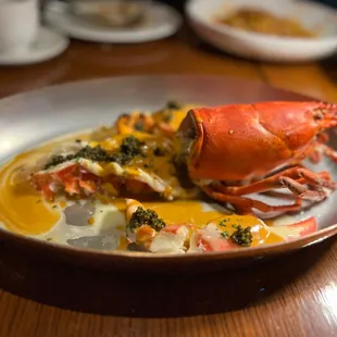 Live lobster with caviar and butter sauce