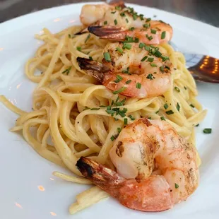 Linguine Pasta with grilled wild gulf prawns and black truffle cream chives