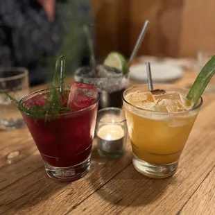 two cocktails on a table