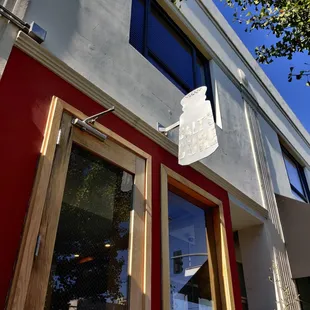 a satellite dish mounted on the side of a building