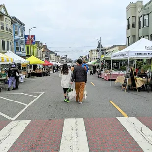 a couple walking down the street