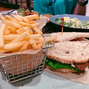 a sandwich and fries