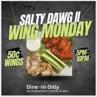 a plate of wings and celery
