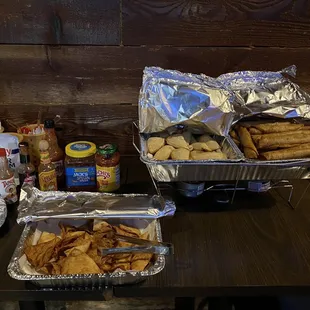 Homemade seasoned pita chips and condiments to boot!