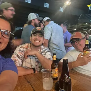 a group of people sitting at a table