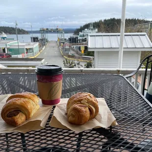 Chocolate croissant, almond croissant and chai latte with a great view of the harbor