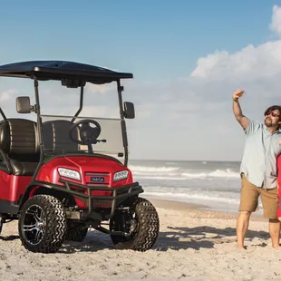 Families enjoying making memories on the beach in our luxury golf carts.