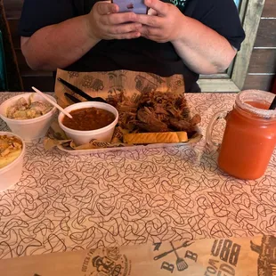 a man taking a picture of his food