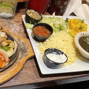 Beef Fajitas with rice and beans.