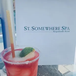 a drink in a glass with a straw