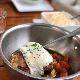 Beef shoulder and cheese grits