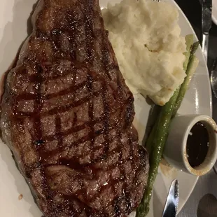 Medium cooked ribeye with special sauce recommended by steak gourmet!