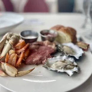 Dungeness crab legs, prime rib, oysters on the half shell and  1/2 a croissant