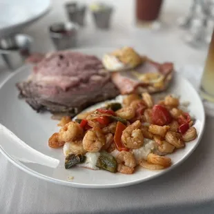 Prime rib, shrimp &amp; grits, and eggs Benedict