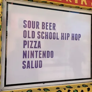 a sign in front of a window
