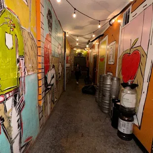 a hallway with graffiti