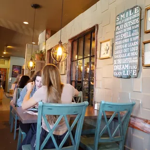 two women sitting at a table