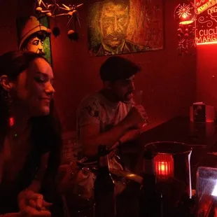 Hanging with new friends. Artists thrive here as outpost for social media and marketing of their product. Drinks are great!