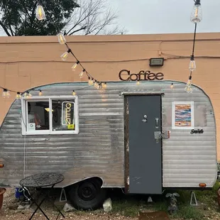 a coffee trailer parked outside