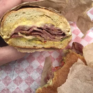 An insanely expensive, mediocre Pastrami sandwich with way too much sauce