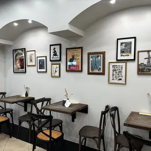 a row of tables and chairs