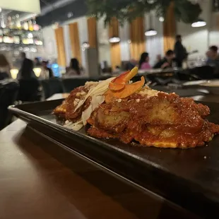 Meat filled ravioli with sausage