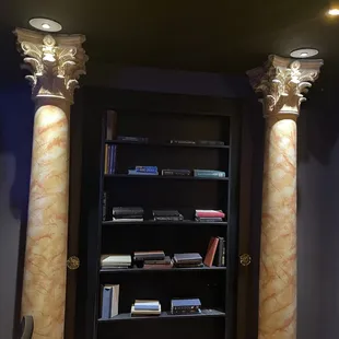 a bookshelf in a library