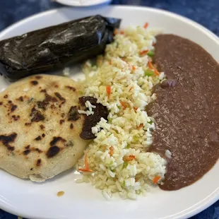 Combo Plate - Spinach pupusa, chicken tamale  rice and beans