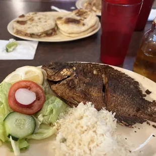Pupusas and mojarra