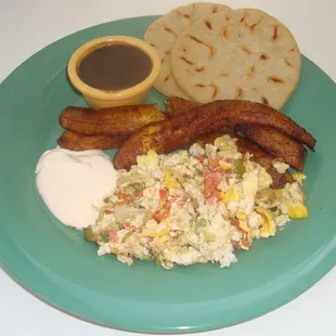 Typical Salvadoran Breakfast-Plaintains, Scrambled eggs, black beans, Salvadoran Crema served with 2 handmade corn tortillas