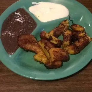 Plantains with black beans and sour cream! YUMMM