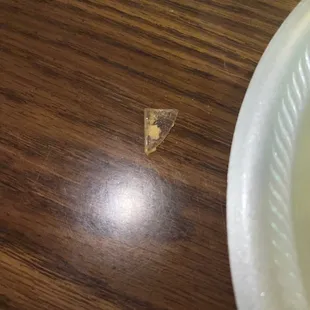 a plate of food on a wooden table