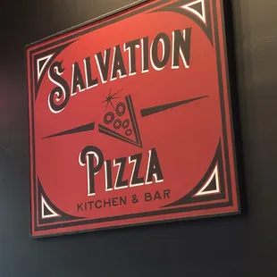 a sign for salvation pizza